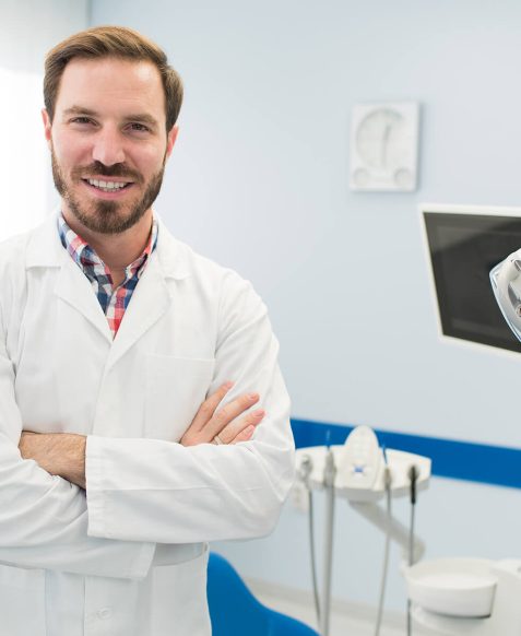 young-attractive-doctor-dentist-smiling